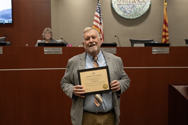 Mayor Honea holds his swearing in certificate