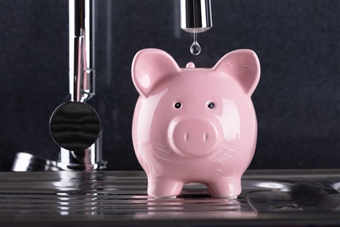 Piggy bank and water faucet